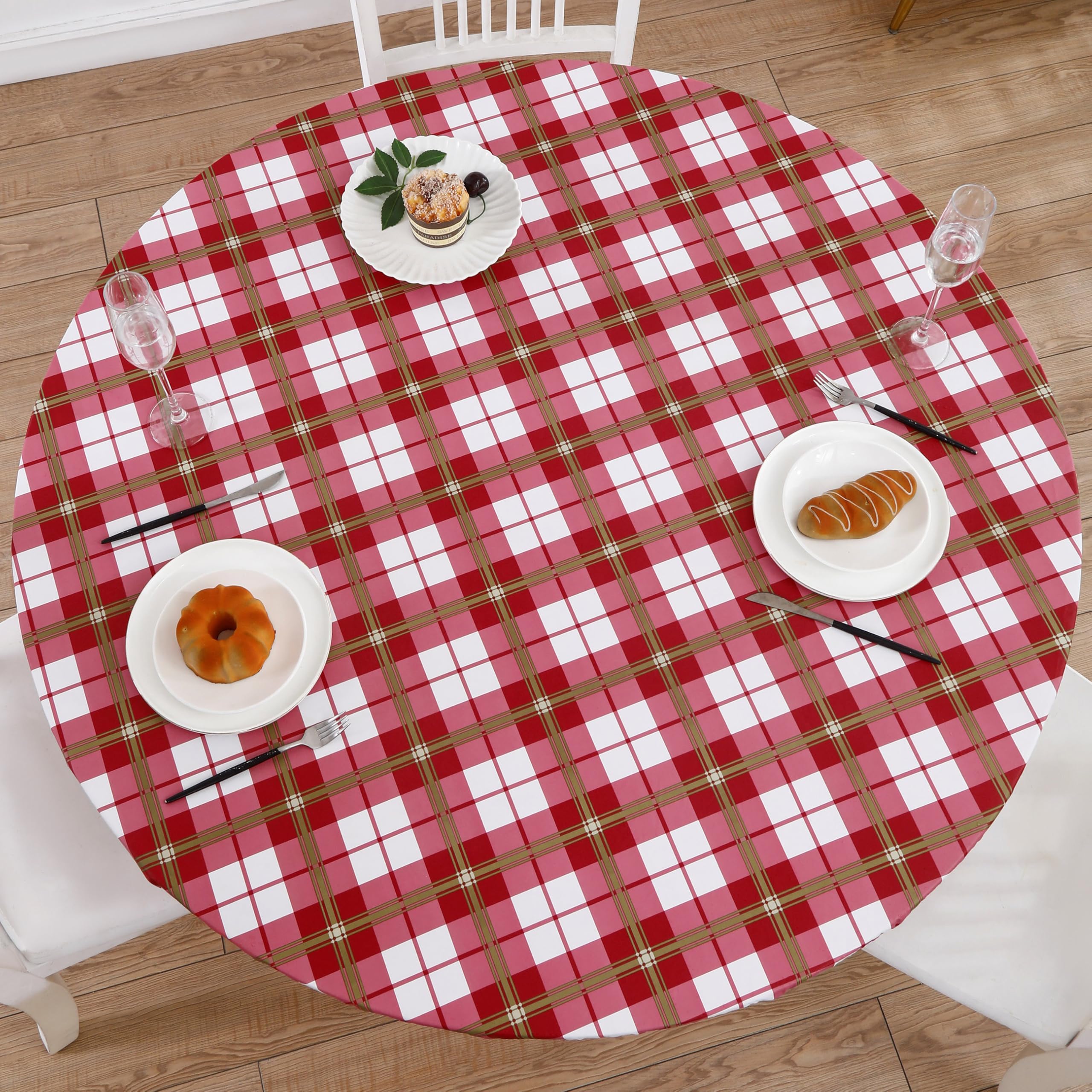 Walrus round vinyl tablecloth on a 57-66 inch table, protecting against spills with style.