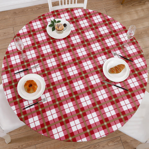 Walrus round vinyl tablecloth on a 57-66 inch table, protecting against spills with style.