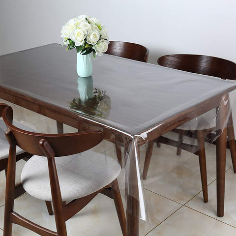 Walrus clear table cover shielding table from spills and stains during meals.