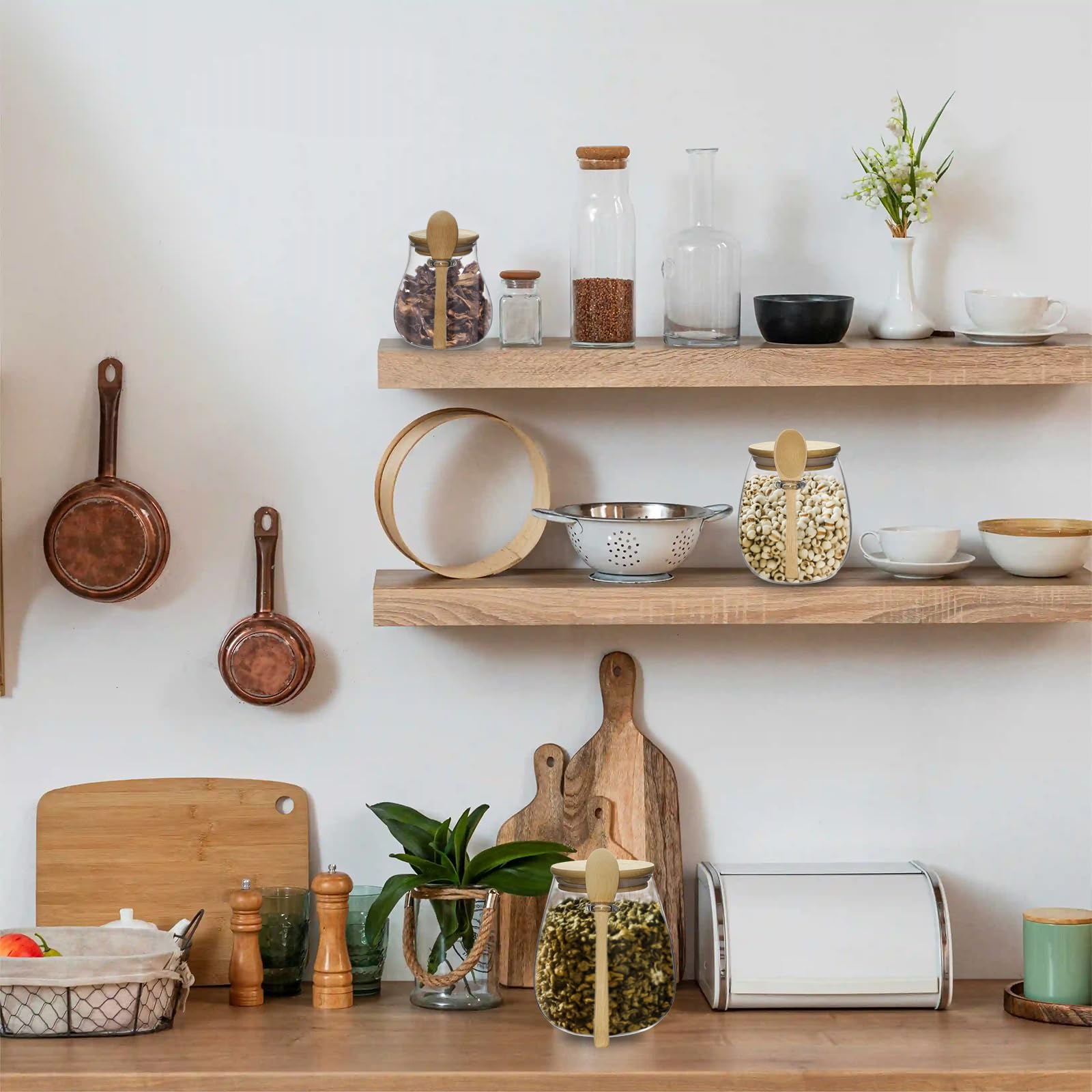 Versatile storage for tea, coffee beans, grains, or snacks in a stylish kitchen.