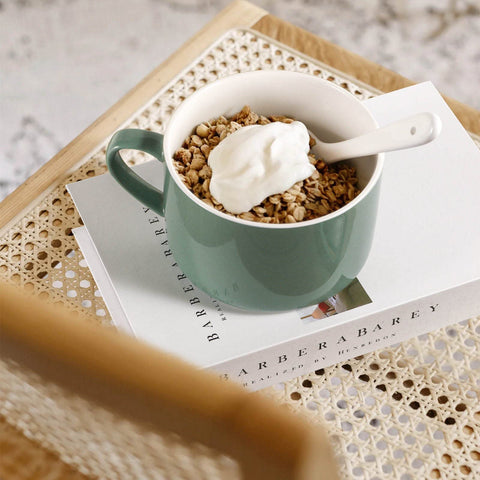 Wareland vent on teal lid supports safe microwave heating.