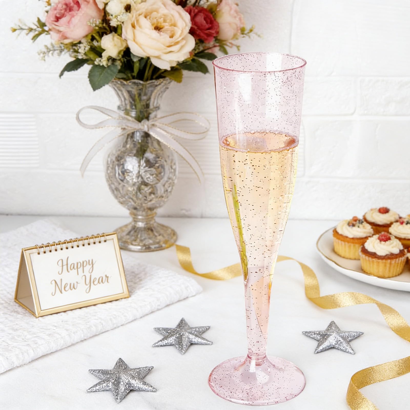 WDF pink glitter champagne flutes with ergonomic design for comfortable sipping.