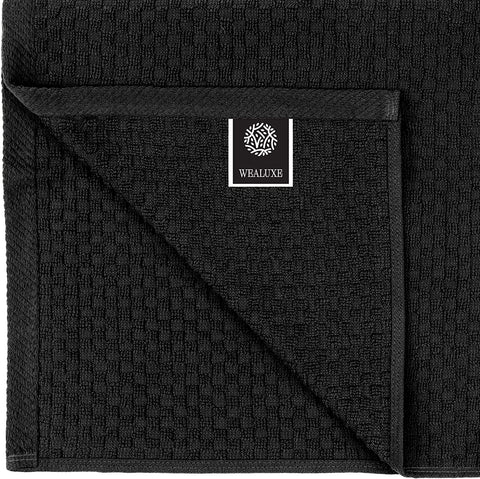 Wealuxe 450gsm black towels show premium absorbency for quick cleanups and drying.