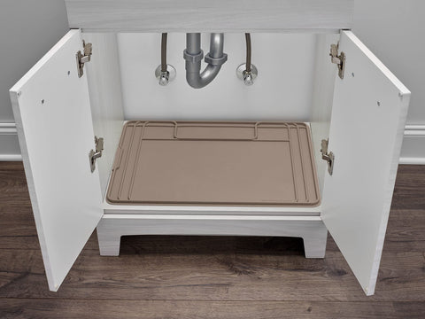 WeatherTech SinkMat with raised lip traps leaks for dry cabinet floors.