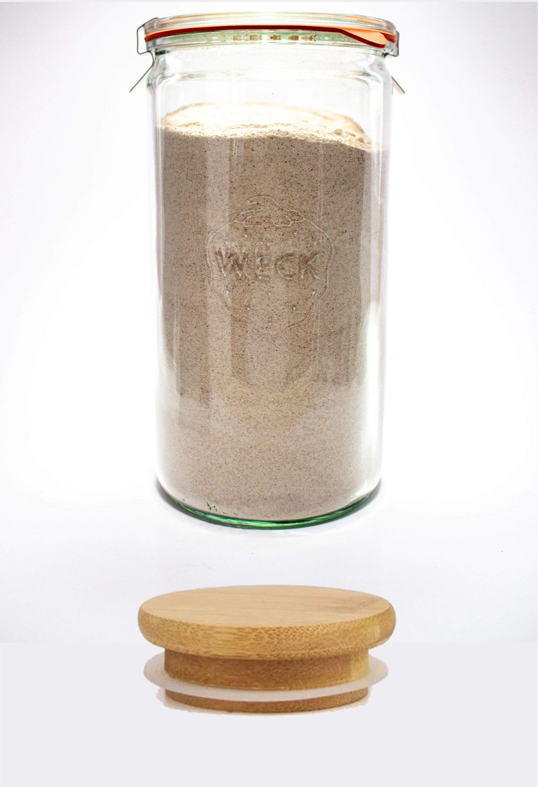 WECK 974 clear glass jar enhances kitchen aesthetics.