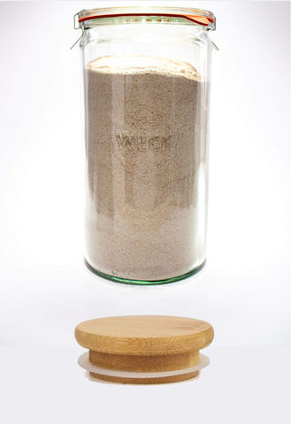 WECK 974 clear glass jar enhances kitchen aesthetics.