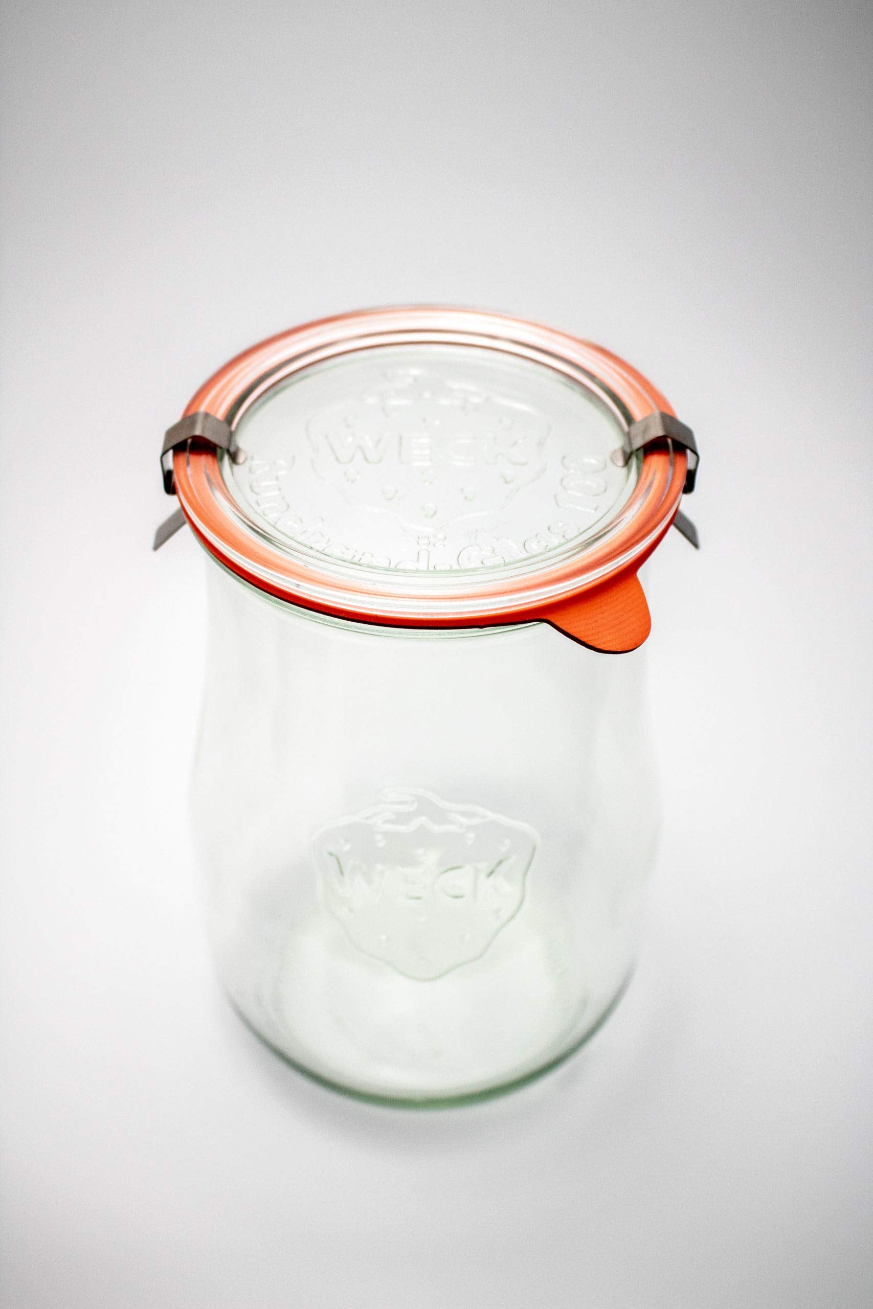 Weck Tulip jar with glass lid and rubber gasket for airtight sealing.