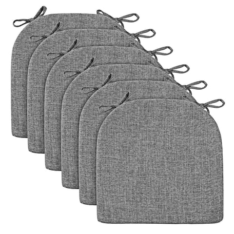 Wellsin chair cushions with ties securing pads to prevent slipping.
