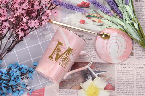 WENSSY M-letter mug handle close-up emphasizes comfortable grip for cozy mornings.