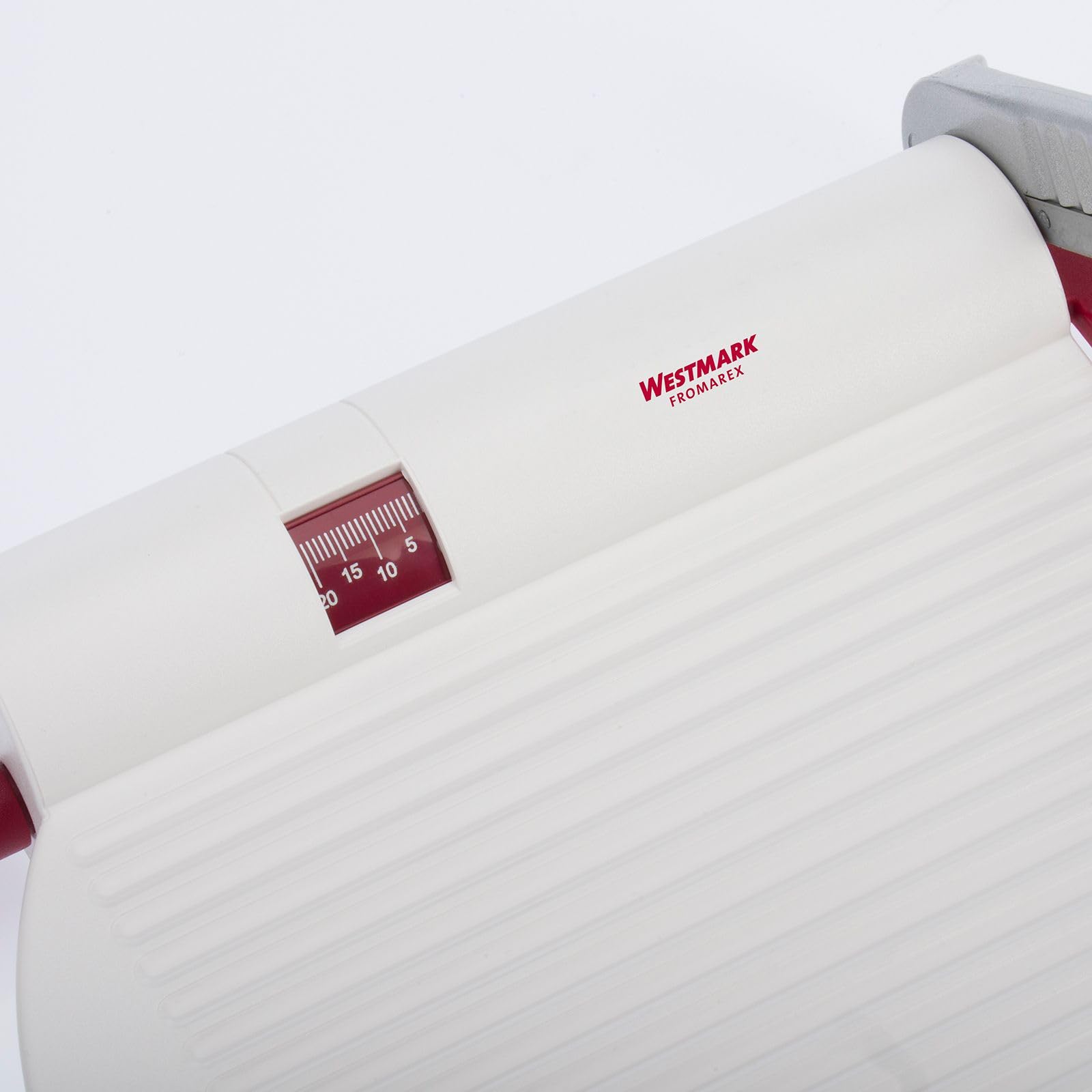 Westmark slicer mounted on board base for stable slicing action