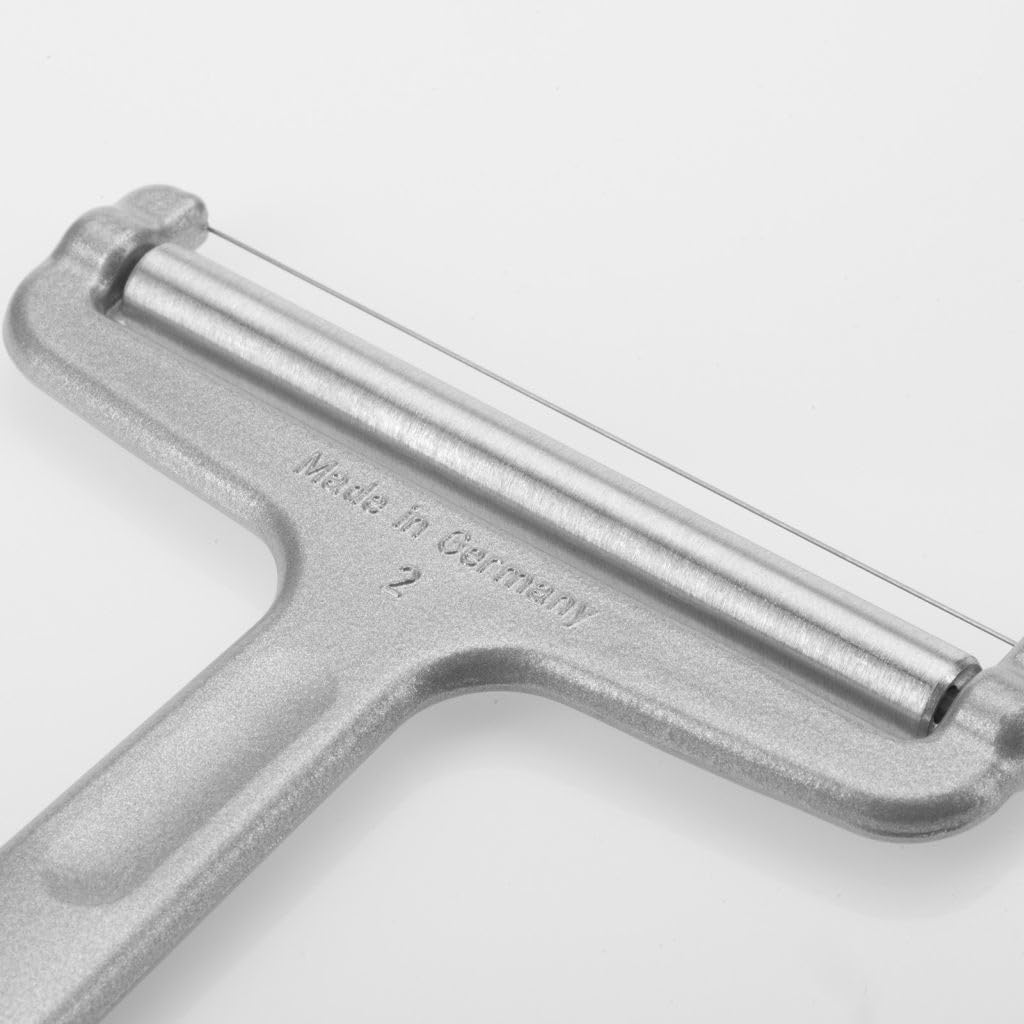 Westmark cheese slicer angle adjustment for varied slice thickness.