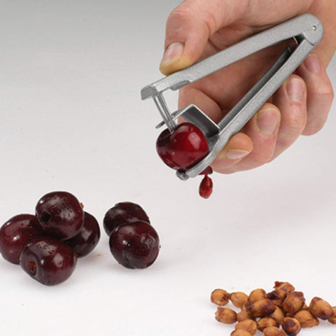 Westmark Kernex cherry pitter shows durable cast aluminum body with powder-coated finish.