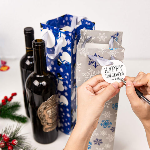 Whaline snowflake design wine bag with protective coating for polished gift wrap.