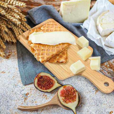 WHEATHUSK multi-use bamboo board for cutting, slicing, and serving.