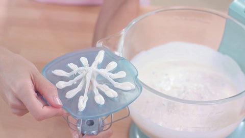 WHISK WIPER PRO red bowl-clean edge design removes residue easily.