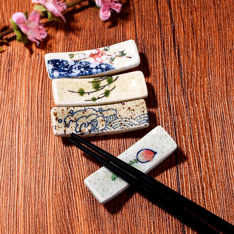 Whitenesser porcelain chopstick rest 4-pack adds elegant table decor.