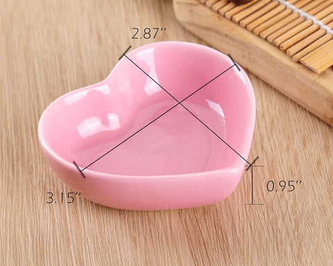 WHJY heart-shaped ceramic dishes closeup highlighting glossy pink glaze