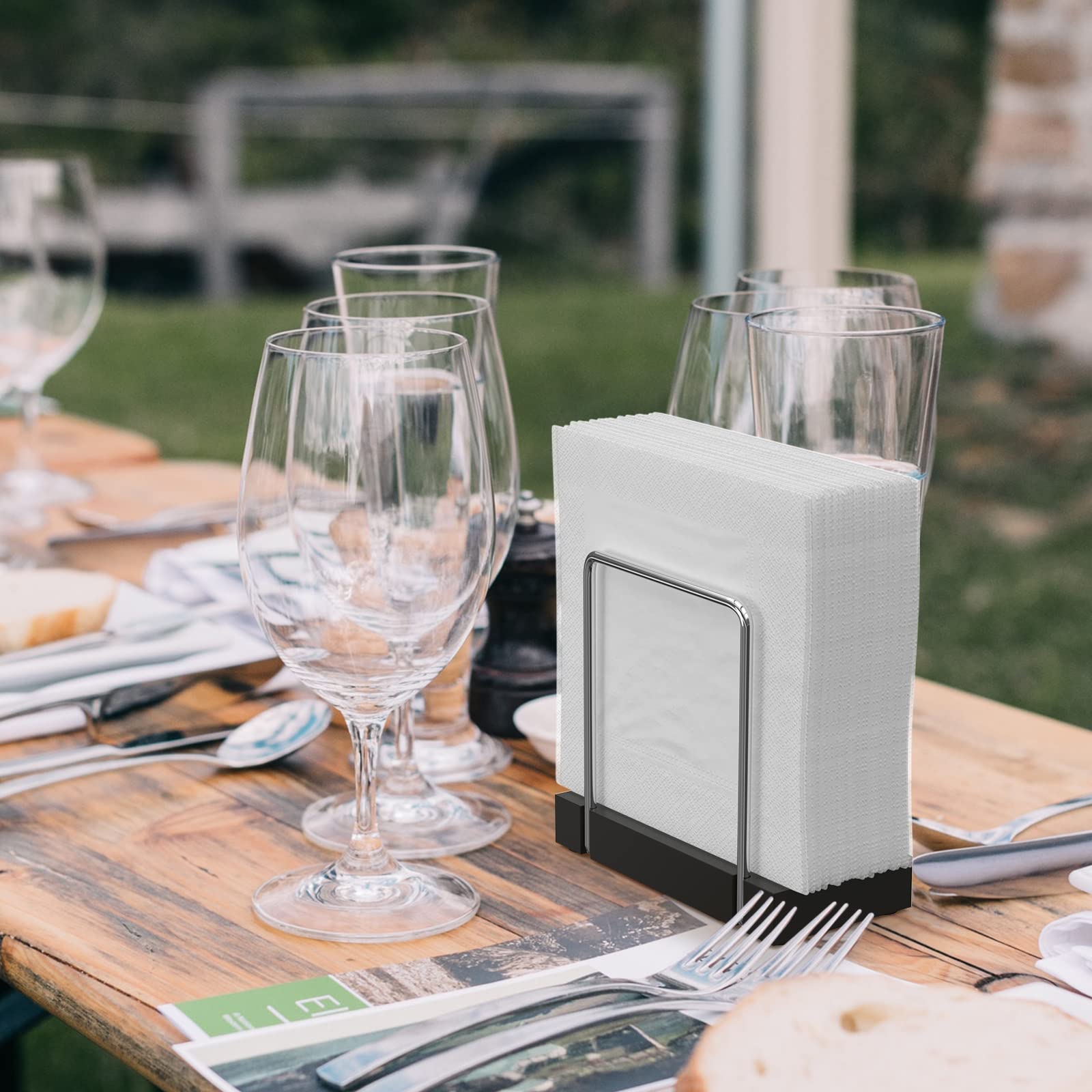 Wican napkin holder bottom with silicone pad prevents scratches and slipping.