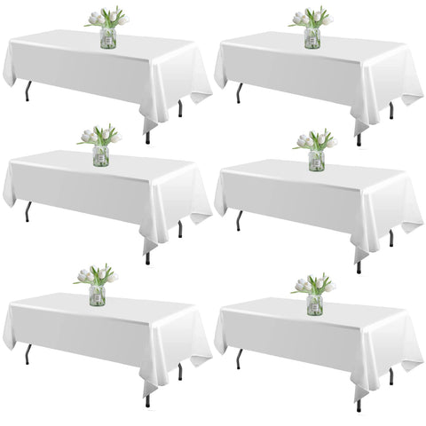 WIGENIUS 6-pack white tablecloth 60x102 inch on table for a sleek dining setup.