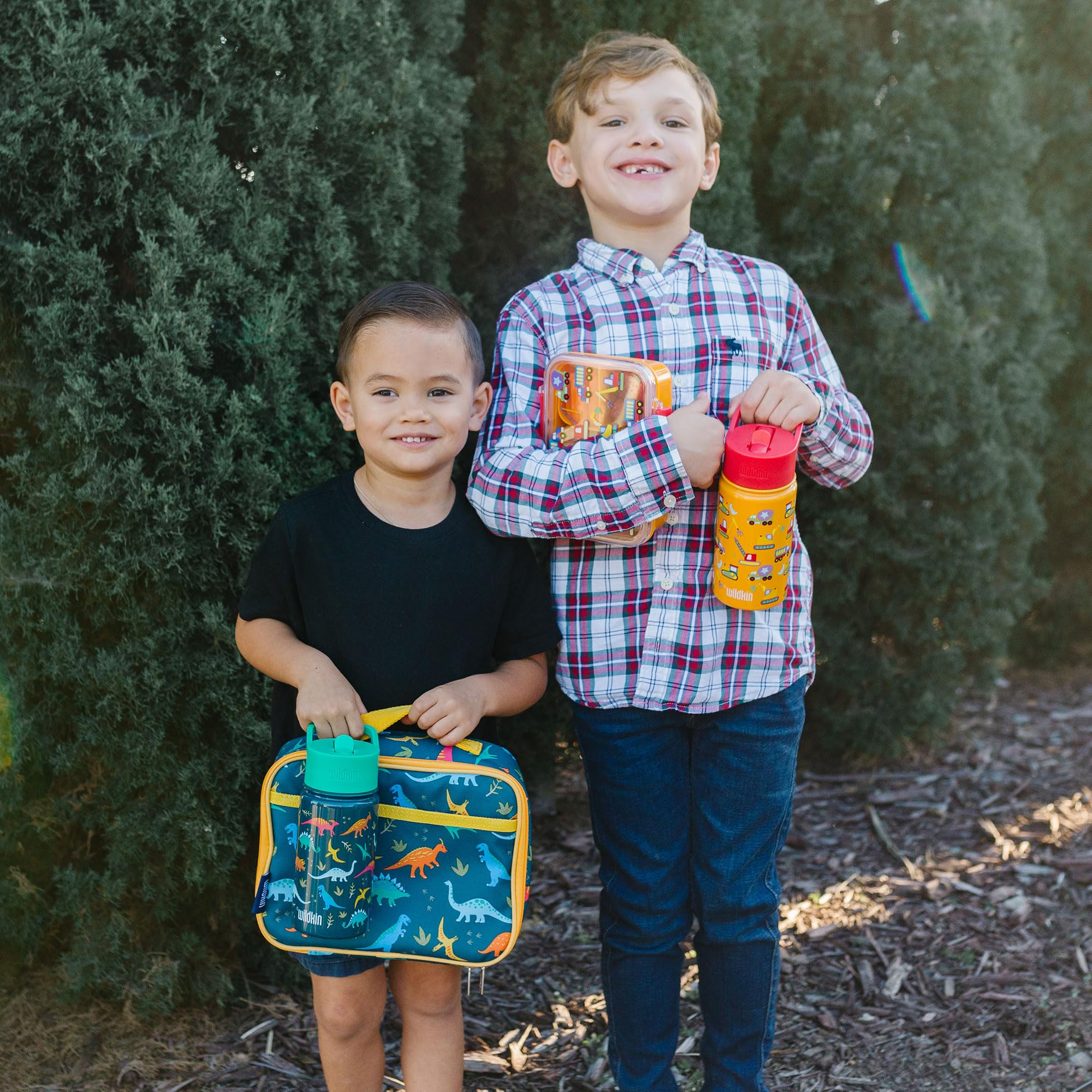 Wildkin Jurassic Dinosaurs lunch box with backpack-matching design for coordinated gear