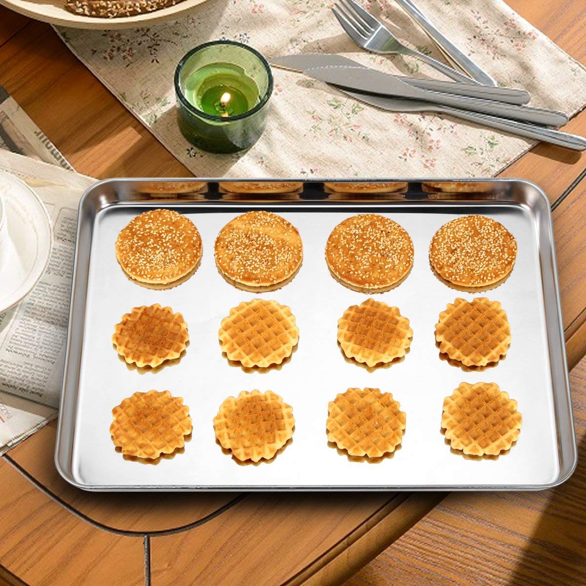 Wildone smooth-edged pans protect hands when transferring hot trays.