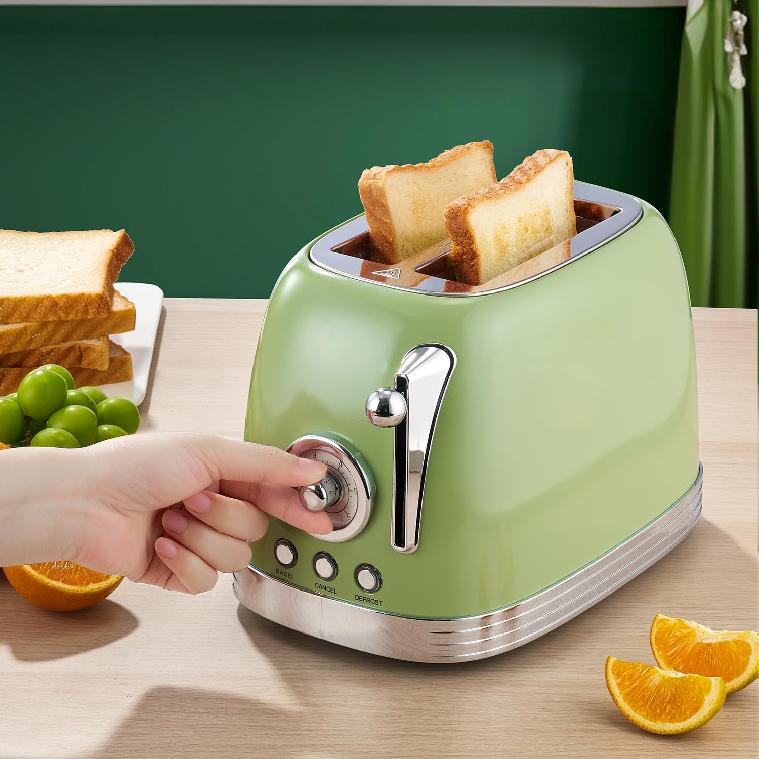 Wiltal Green Retro Toaster removable crumb tray for easy cleaning.