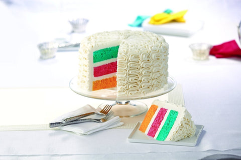 Wilton leveler in use to create flat, even cake layers for stacking