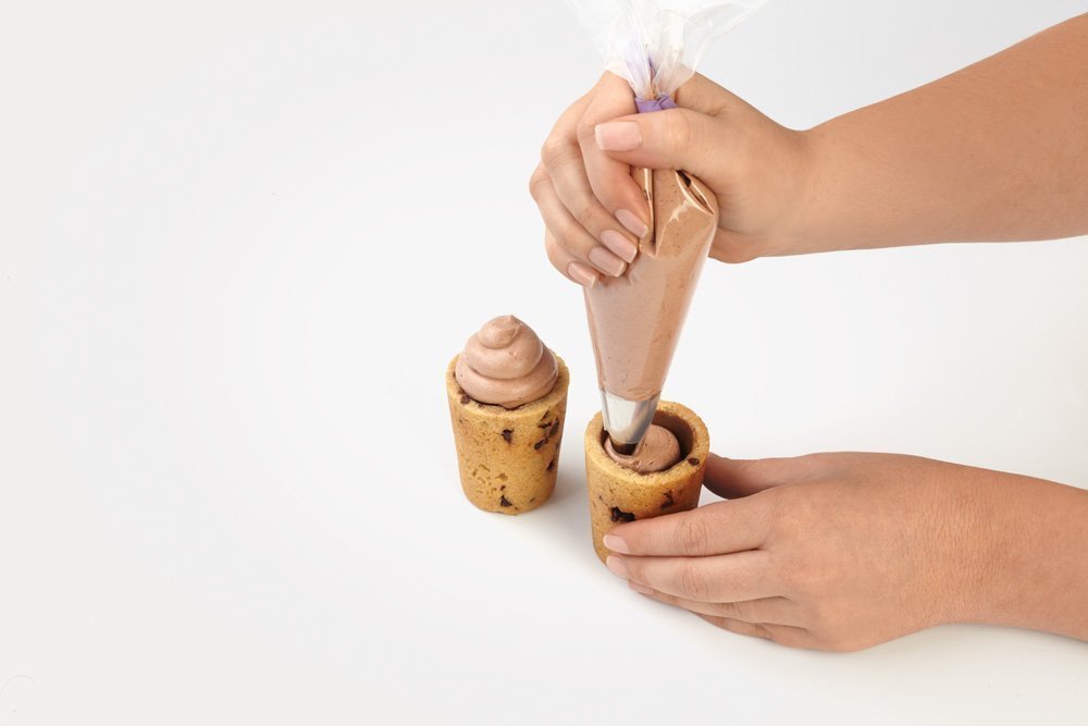 Wilton chocolate cups from the pan suit desserts and creative treats.