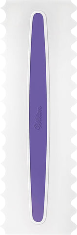 Wilton Comb Icing Smoother white and purple colors add a decorative touch.