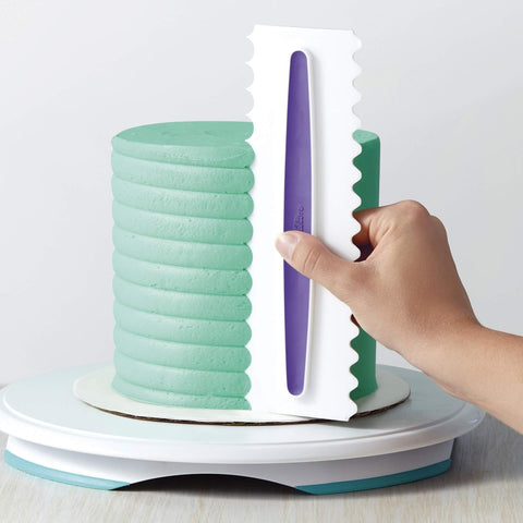 Wilton Comb Icing Smoother durable plastic construction delivers bakery-style frosting textures.