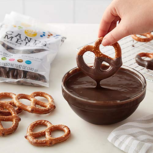 Wilton Dark Cocoa Candy Melts molded into shapes with Wilton molds for candy crafts.