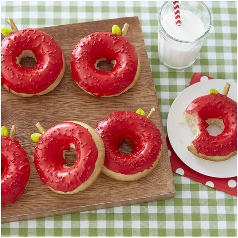 Wilton silicone donut pans offer flexible storage and quick recovery after folding.
