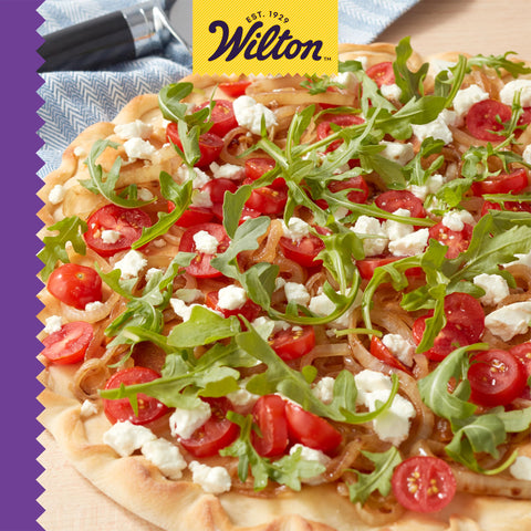 Dishwasher-safe Wilton pizza pan with guidance for longevity and care.