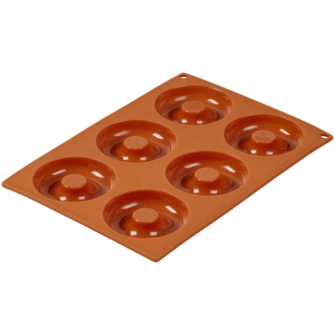 Wilton silicone donut pan with easy-release surface for clean baking.
