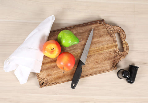 Winlay Mango Wood Chopping Board knife-friendly surface demonstrated in use.