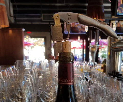 Wino Wine Key bottle opener in action for quick service and bar prep.