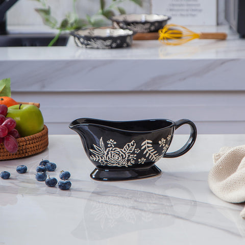 Wisenvoy gravy boat serves sauces or dressings with style.