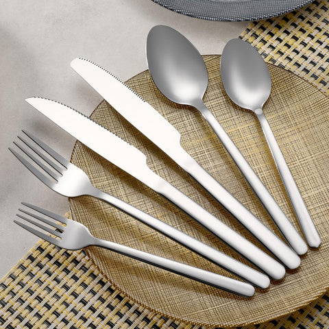 WISKEMA dessert spoons offering comfortable weight for smooth scooping.