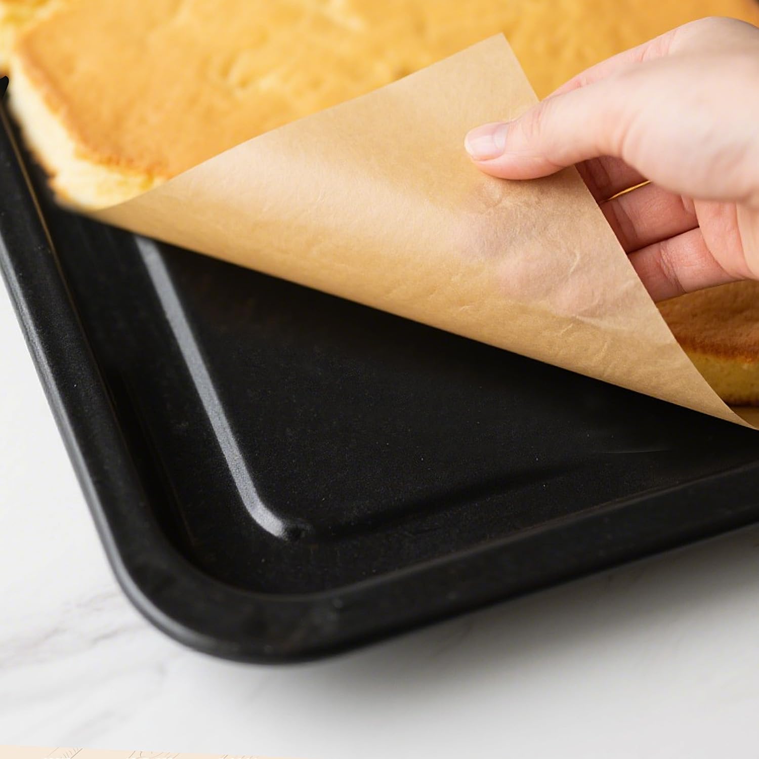 WKTML baking paper keeps surfaces clean and makes cleanup after cooking easy.
