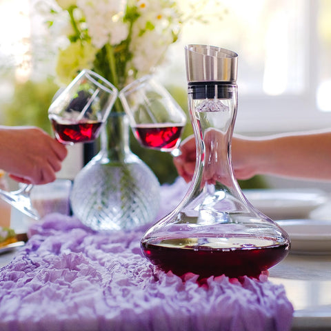 Wlasss crystal decanter with stainless pour lid for clean, drip-free pouring.
