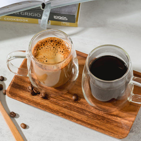 Wlasss double-wall glass cups show insulation and inner-outer design features.