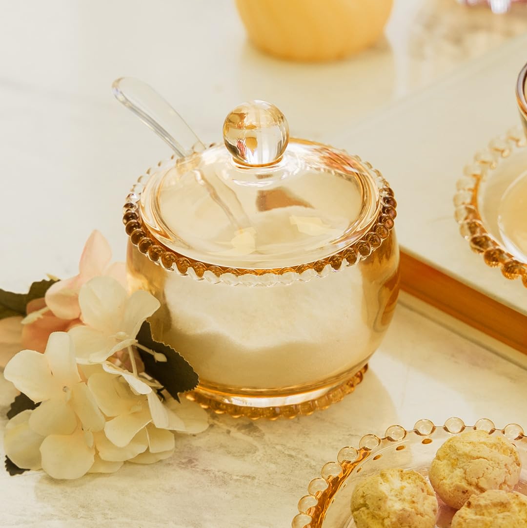 WOLFF Sugar Bowl displayed in cabinet highlighting amber crystal design.