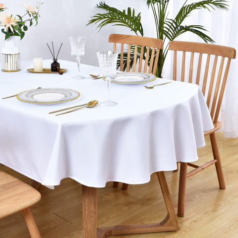Wolkemer small oval tablecloth 52x70 in white, ideal for formal dining settings.