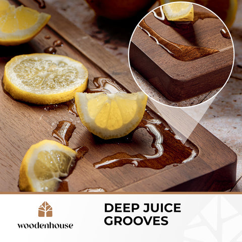 Woodenhouse acacia cutting board with built-in handles for easy transport.