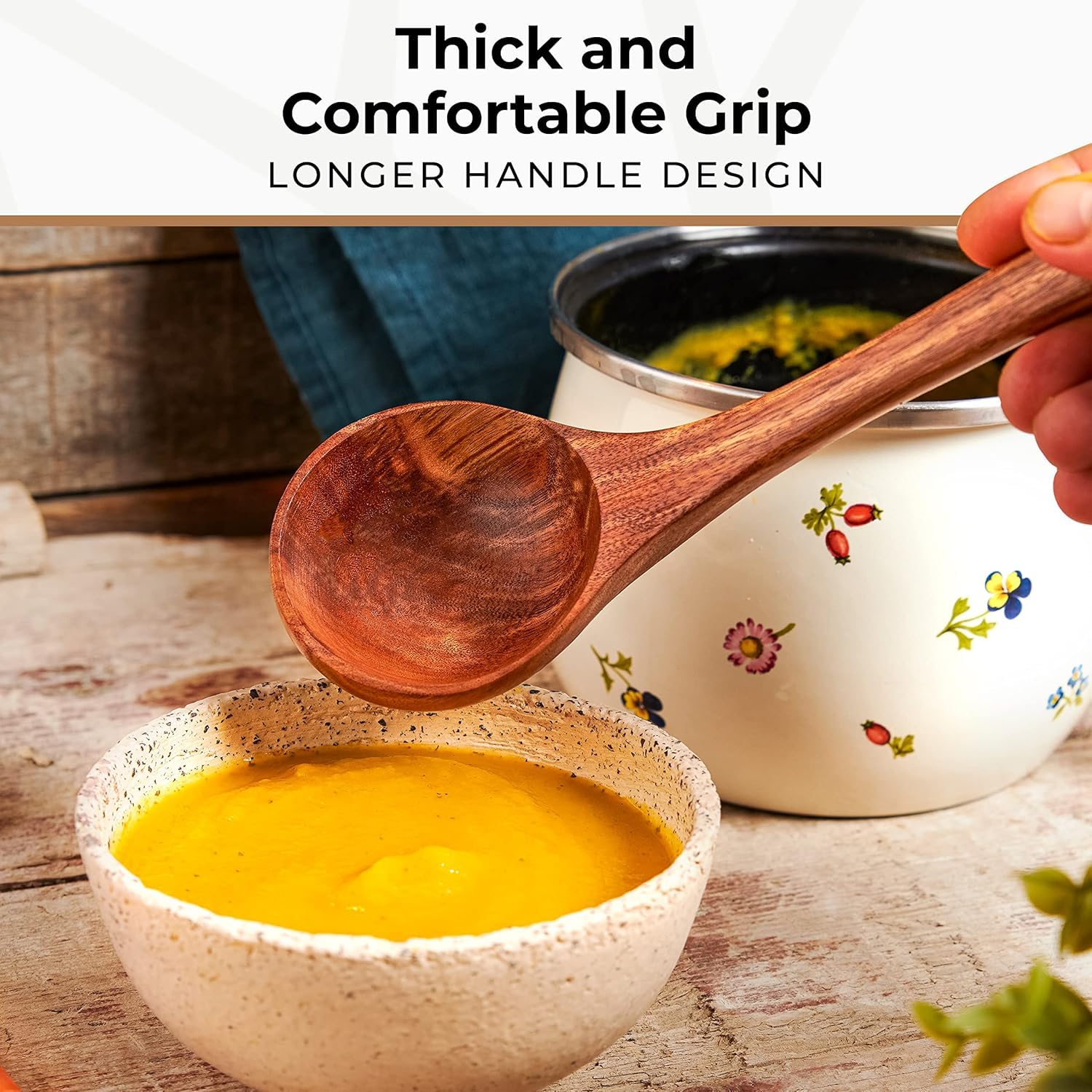 Woodenhouse handcrafted teak ladle adds warmth to serving bowls and pots.