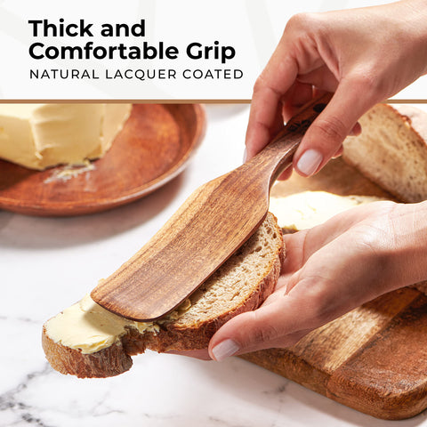 Woodenhouse spurtles stirring in a pot, designed to prevent sticking on non-stick surfaces.