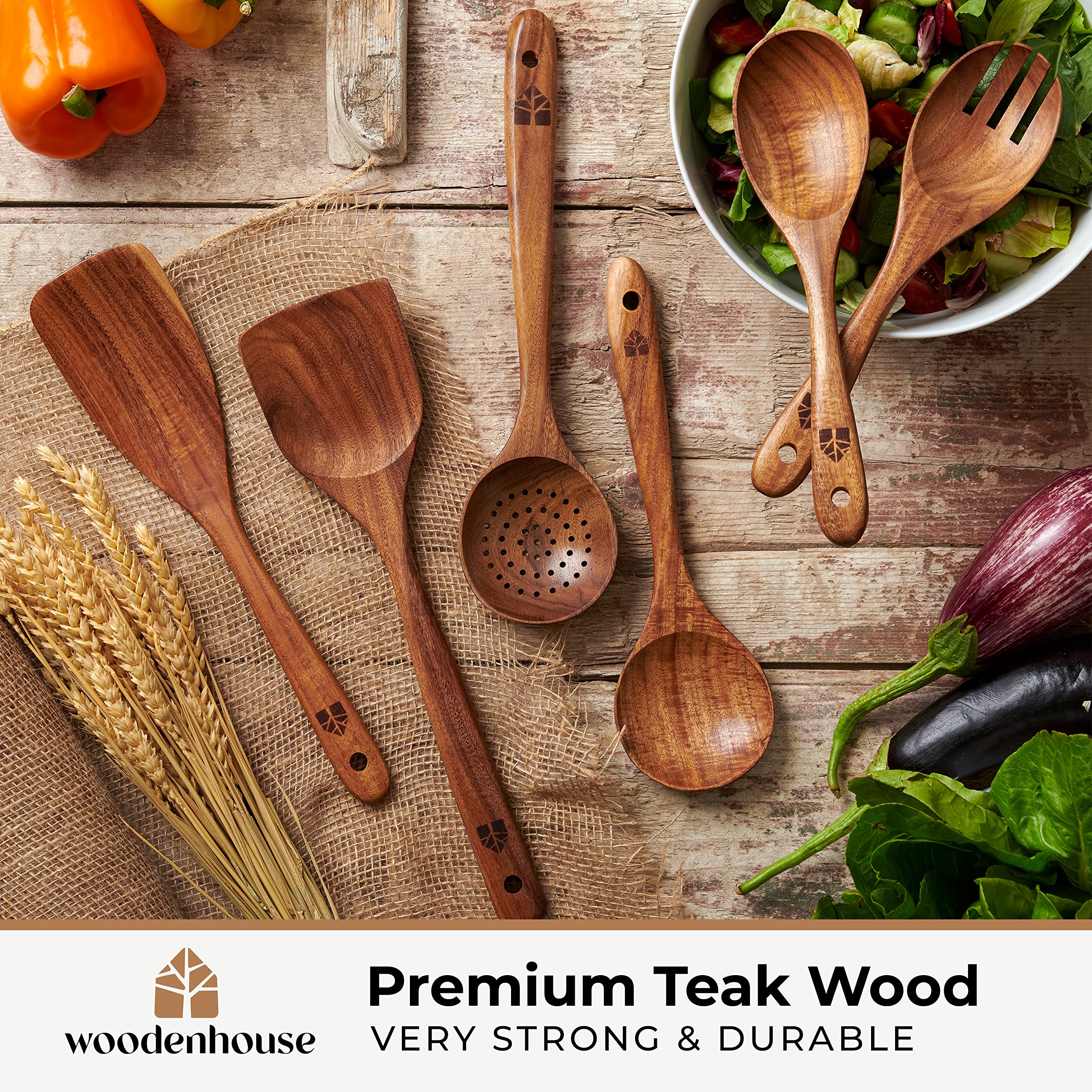 Woodenhouse teak wok spatula for high-heat cooking with scratch-free control.
