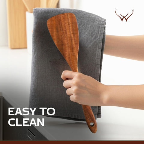 Woodlands USA non-scratch spatula protects nonstick pans during cooking.