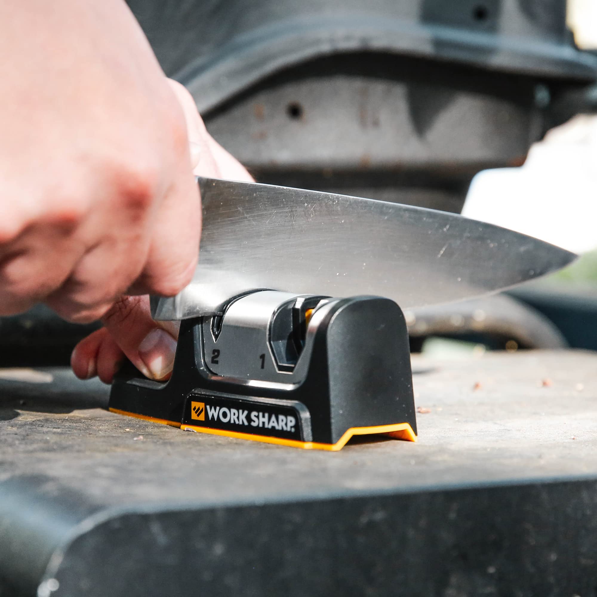Work Sharp contoured base stabilizes sharpening on a kitchen counter.