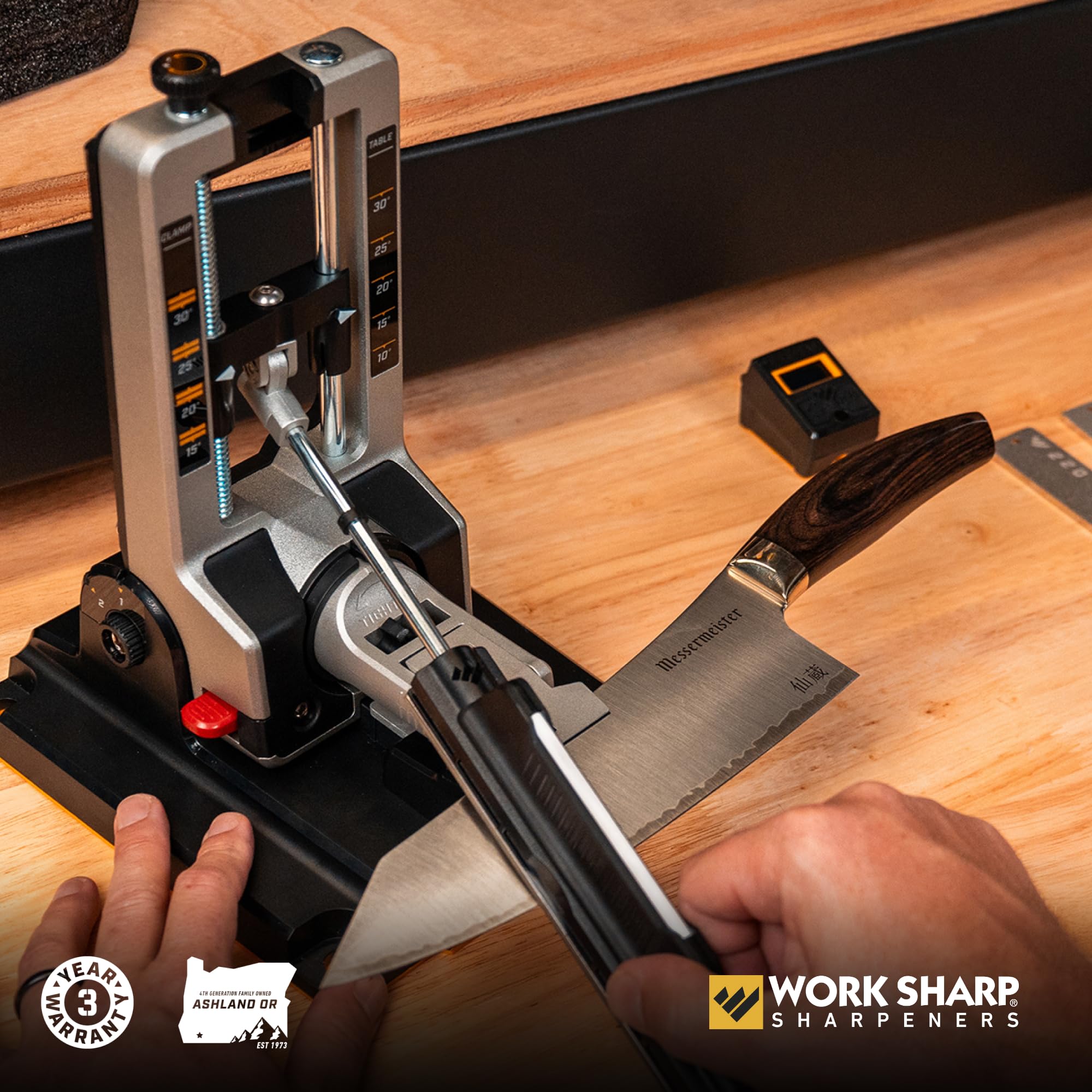 Work Sharp Professional Precision Adjust Elite kitchen sharpening in action on blades.